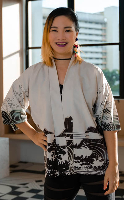 deniece-profile-pic Woman with bright coloured hair named Deniece